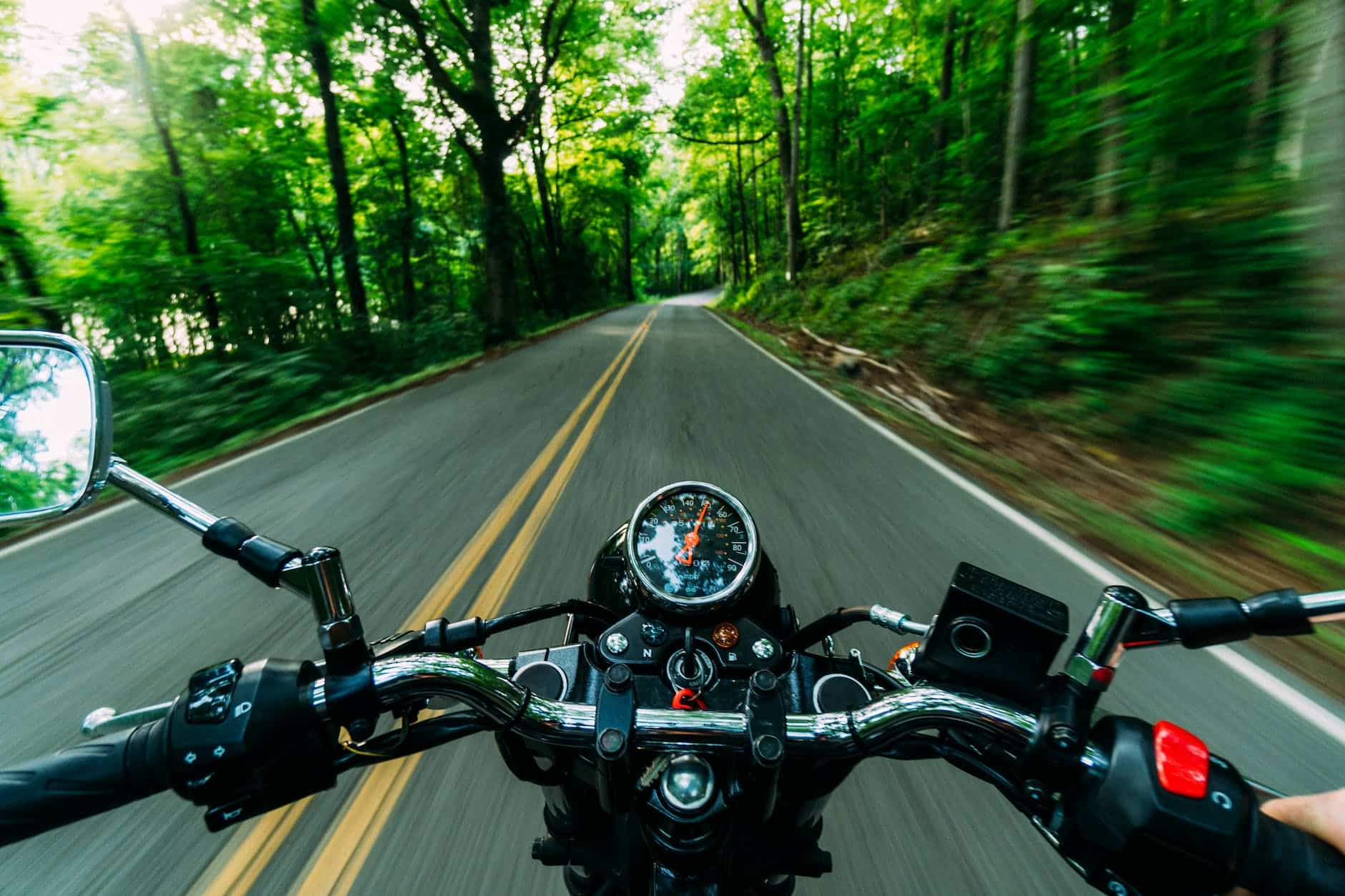 motor bike running close up photography
